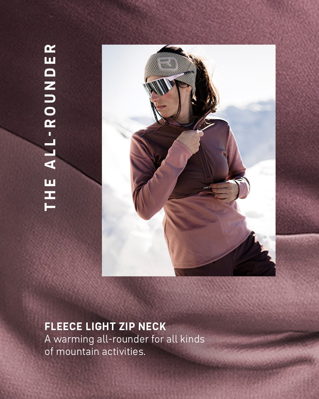 Frau in altrosa FLEECE LIGHT ZIP NECK vor verschneiter Kulisse
