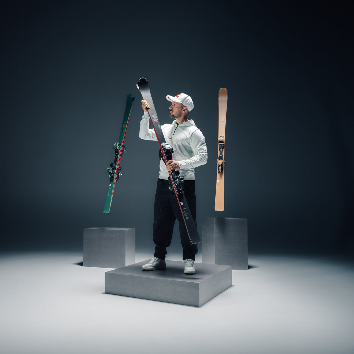 Marcel Hirscher with three VAN DEER skis in the studio